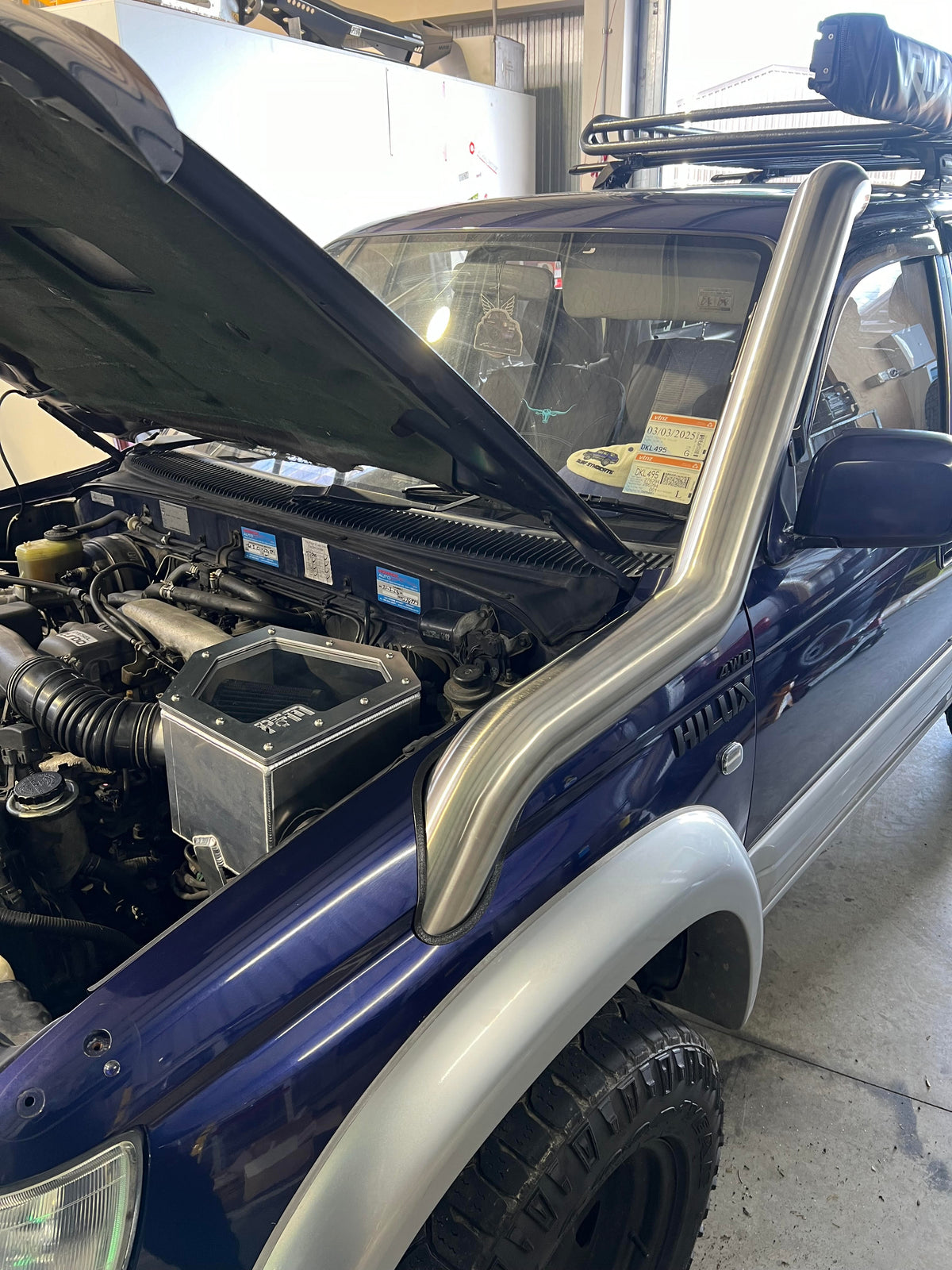 Car With The Front Hood Open